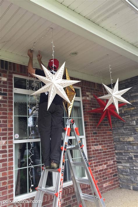 Hanging Star Lanterns A Christmas Front Porch Decorating Idea The