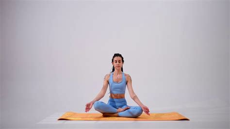 Young Woman Meditating In Lotus Position Stock Video Footage 0025 Sbv
