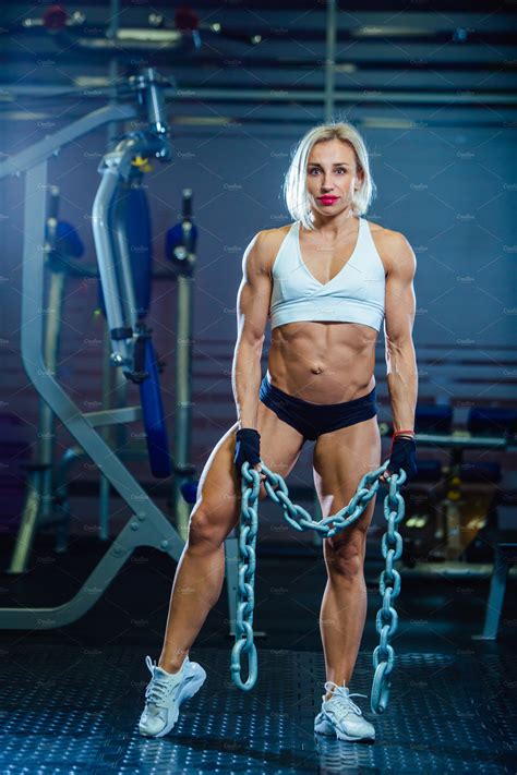 Young Sexy Woman Doing Exercises With Heavy Chain In Gym Classic