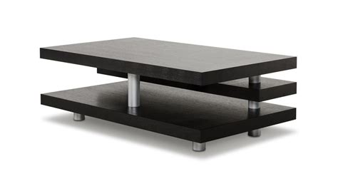 Proudly made in the usa from solid pinewood, this compact piece measures 17.5'' h x 36'' w x 14.5'' d overall and supports up to 200 lbs., allowing it to double as a table and a spare seat. A&X Adrian Modern Multi-Tier Black Oak Coffee Table