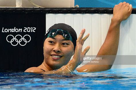 Japans Satomi Suzuki Waves After The Womens 200m Breaststroke Heats