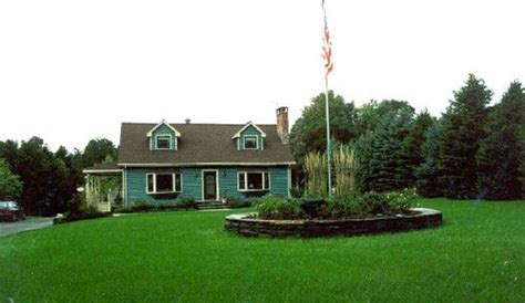 Shop for garden flagpoles in flagpoles. Goshen stone wall creating a raised planting bed with flag ...