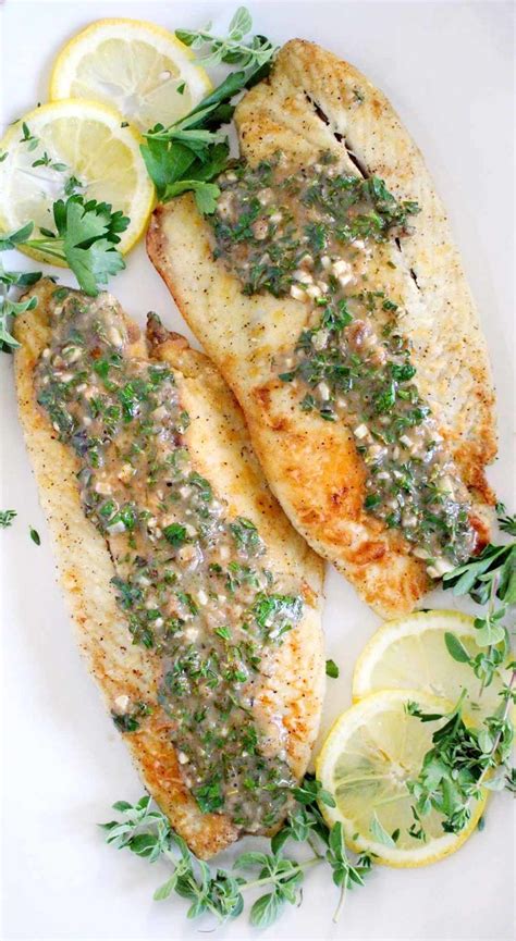 Pan Fried Sea Bass With Lemon Garlic Herb Sauce Recipe Sea Bass Recipe Pan Seared Recipes