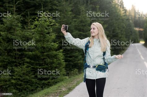 Young Female Hiker Taking A Selfie Stock Photo Download Image Now