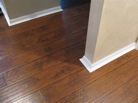 Shop our selection of laminate trims, available in a variety of styles to complete your project. Rustic Laminate with baseboard detail. | Floor trim ...