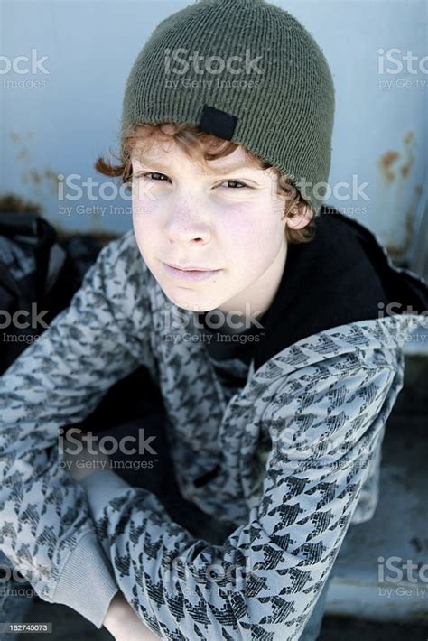 Boy Sitting On Old Stairs Stock Photo Download Image Now Arms