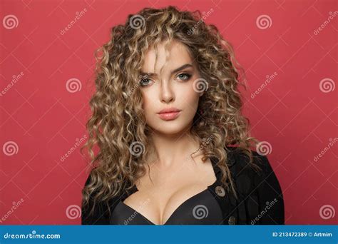 Nice Perfect Woman With Long Curly Hair On Red Background Pretty Model With Trendy Styling And