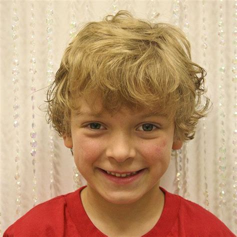 Style low fade for sides and back hair and create waves for the crown hair. Haircuts Curly Hair & Wavy Hair » Curly boy cut | Twin ...