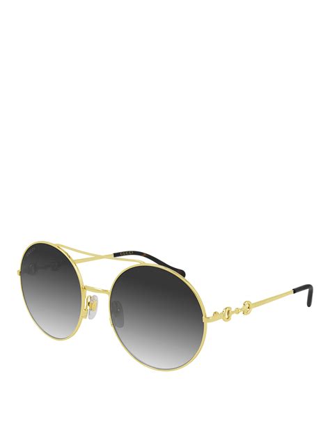 Gucci Rounded Sunglasses In Gold Modesens