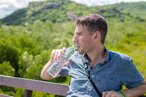 Man Drinking Water In Nature — Stock Photo © Skat36 115393230