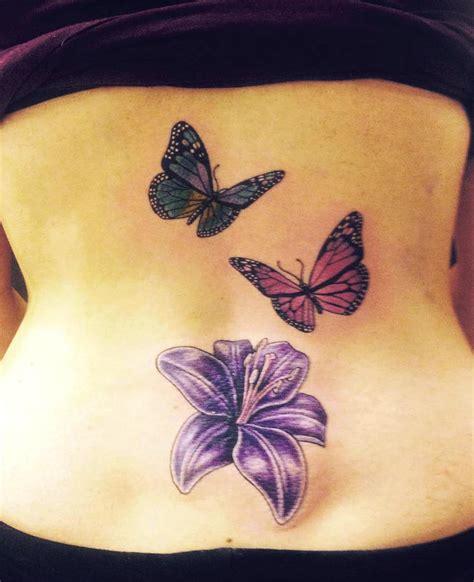 Butterfly tattoos, female tattoo, feminine tattoo, lower back tattoo. 28 Awesome Butterfly Tattoos with Flowers That Nobody Will Tell You