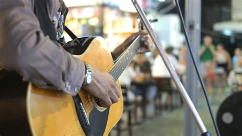 Man Playing Guitar On Street Stock Footage Video 4424804 Shutterstock