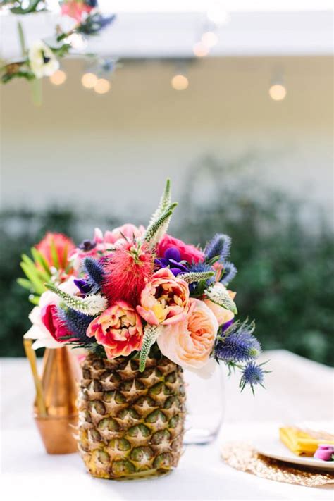 15 ways to throw the best decorated picnic ever via brit co pineapple centerpiece pineapple