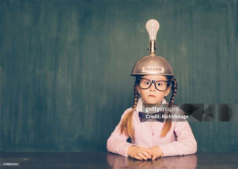 Young Nerd Girl With Thinking Cap High Res Stock Photo Getty Images