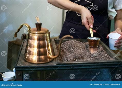 Cooking Traditional Turkish Coffee In Copper Jezva Pot Selective Focus