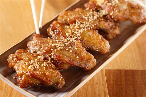 Crispy japanese fried chicken wings glazed with a sweet and garlicky glaze. Mr. Taka Is a Tokyo Ramen Master's Introduction to NYC