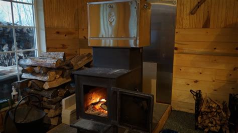 Wood stoves and fireplace inserts can be used to cook food over the fire generated by burning wood. Off grid wood stove baking with Amish oven - YouTube