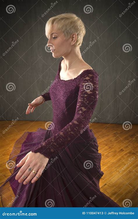 Young Woman In Purple Dress Dancing In The Studio Stock Image Image
