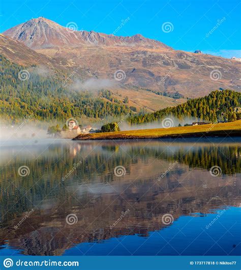 Mountain Lake At Sunrise In Autumn Landscape With Lake Gold Sunlight