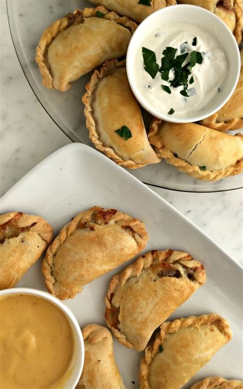 Philly Cheesesteak And New England Clam Empanadas Pickled And Poached