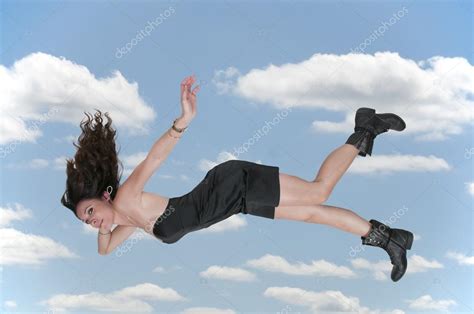 Woman Falling Through The Sky — Stock Photo © Robeo123 73892887