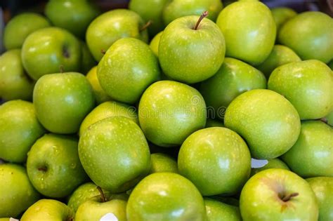 Piles Of Fresh Abundant Beautiful Delicious Bright Green Apple Fruit