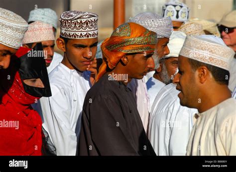 People From Oman Men Wearing A National Costume Dishdasha And A Kummah