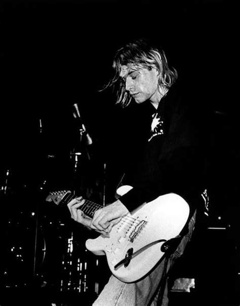 The front of the shirt features a print of the unmistakable, characteristic nirvana. Grunge. | Kurt cobain, Nirvana kurt cobain, Black and white