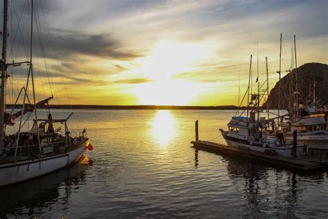 Free Stock Photo Of Sunset Between Boats In Morro Bay Harbor