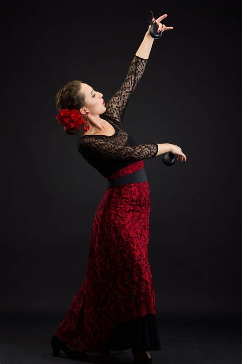 Spanish Woman Dancing Flamenco On Black Spanish Clothing Spanish Outfits Traditional Spanish