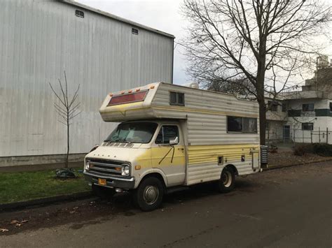 Curbside Outtake Generic Late 70s Dodge Class C Motorhome Tin Boxes