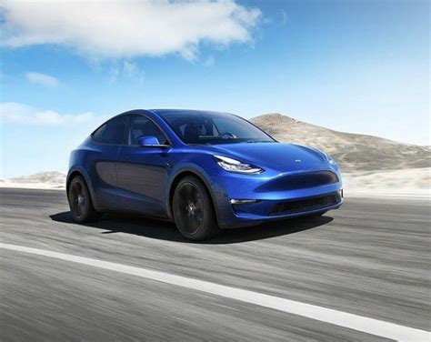 This should be delivered this year. Tesla Unveils 7-Seater Model Y All-electric SUV With 300 ...