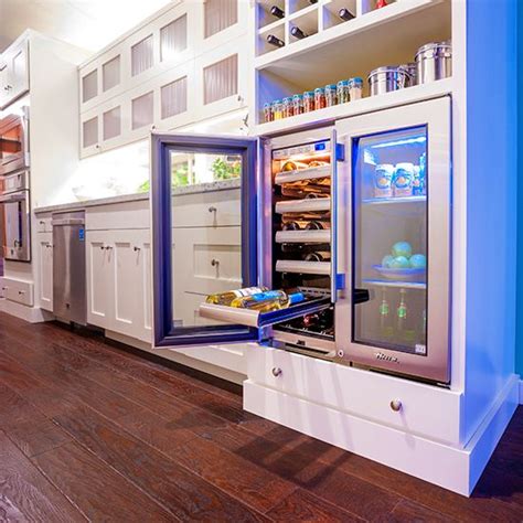 This modern glass wine fridge is the only choice for the avid wine lover. 24 Modern wine refrigerators in Interior Designs - MessageNote