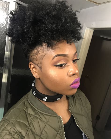 Half side shaved hairstyles for black women. Natural hair undercut. Undercut puff. Natural hair shaved ...