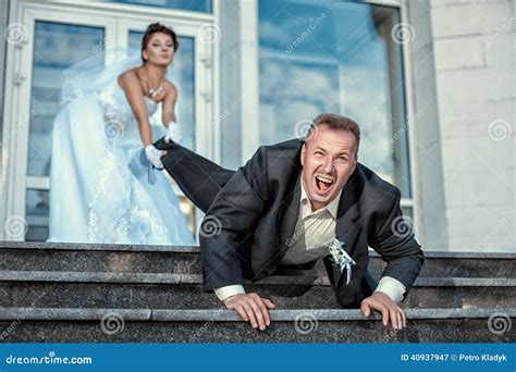 Bride Dragging Groom At The Wedding Stock Image Image Of Drollery