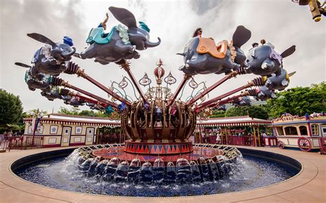 Soar High In The Sky On A Fanciful Flight Above Fantasyland With Dumbo