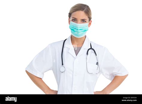 Nurse Wearing Surgical Mask With Hands On Hips Stock Photo Alamy