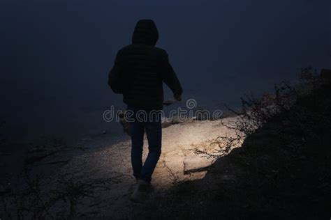 Man With Flashlight Walking Near River Stock Image Image Of Hike