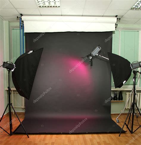 Empty Photo Studio With Lighting Equipment — Stock Photo © Belchonock