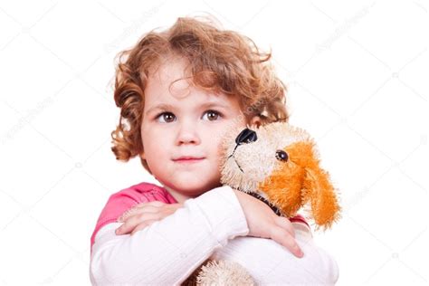 Pretty Girl Hugging Toy Dog — Stock Photo © Luckybusiness 3339706