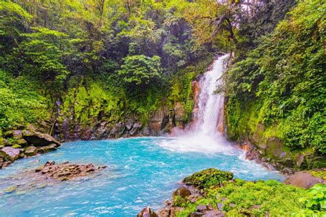 Rio Celeste Waterfall And Pond In Tenorio Volcano National Park