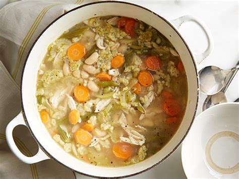 Bring chicken, rice, garlic, ginger, and 5 cups water to a boil in a large saucepan. Soul Warming Chicken Soup Recipes : Food Network | Recipes ...