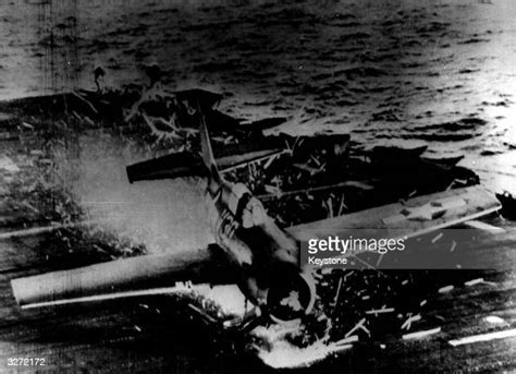 An American Plane Crash Lands On The Deck Of A Carrier Sparks And