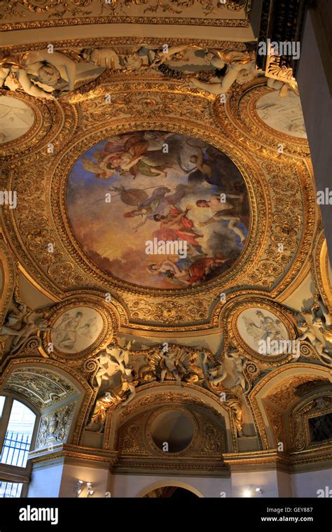 Intricately Painted Ceilings Line The Roof Of The Louvre Museum In