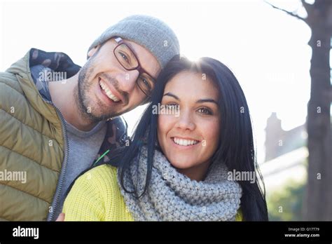 Portrait Of Mid Adult Couple Looking At Camera Smiling Stock Photo Alamy