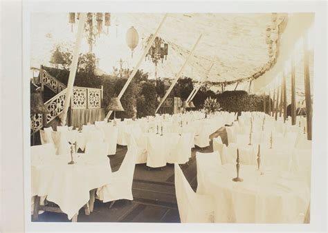 Five Vintage Photographs Of The Preparations For An Outdoor Party On