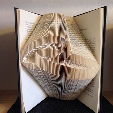 Interessante und empfehlenswerte origami bücher darunter: Book folding pattern for A set of wedding rings ~ Wedding bands ~ +FREE TUTORIAL | Book folding ...