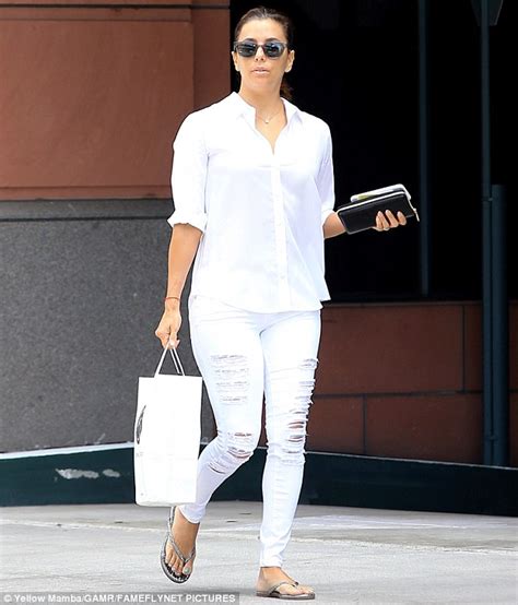 Eva Longoria Cuts A Stylish Figure In Ripped Jeans And A Button Up