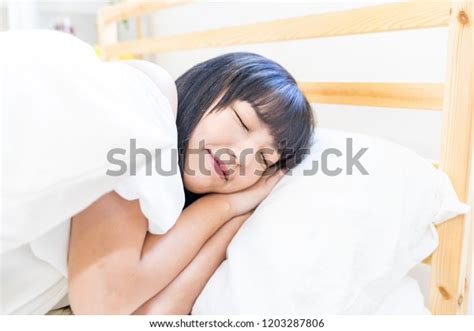 Стоковая фотография 1203287806 20s Chinese Girl Sleeping On Bed Shutterstock