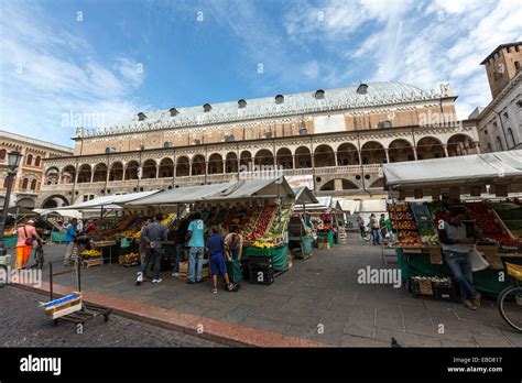 Vegetable Market In Piazza Dell Erbe With The Palazzo Della Ragione Stock Photo Alamy